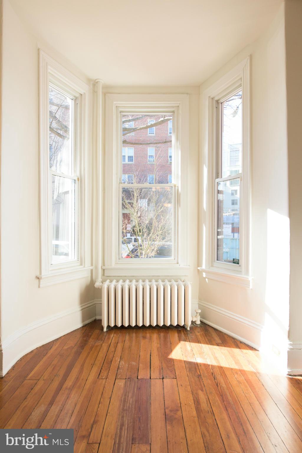 411 3rd Street Northeast Washington, DC 20002 - Photo 17 of 30 Living Room sunny west bay!