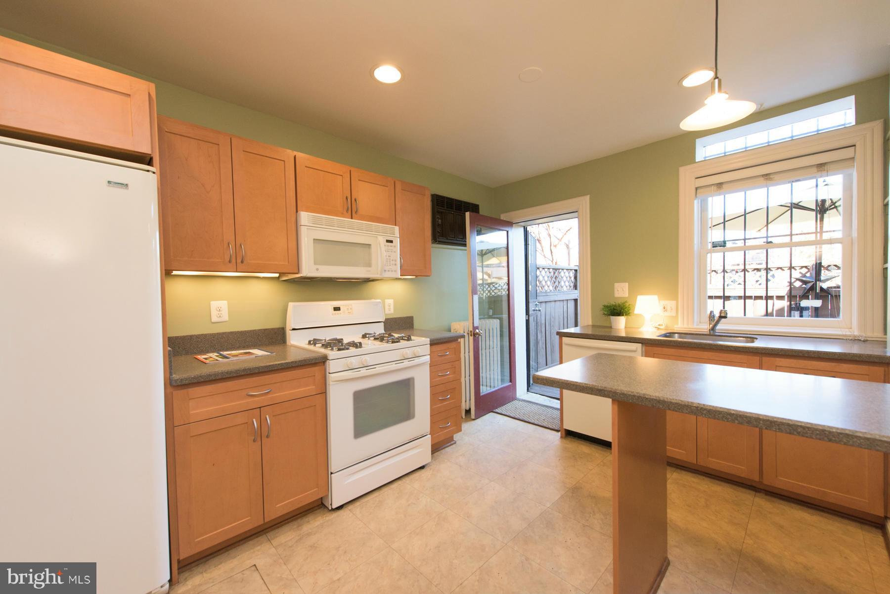 411 3rd Street Northeast Washington, DC 20002 - Photo 4 of 30 Sunny east facing kitchen