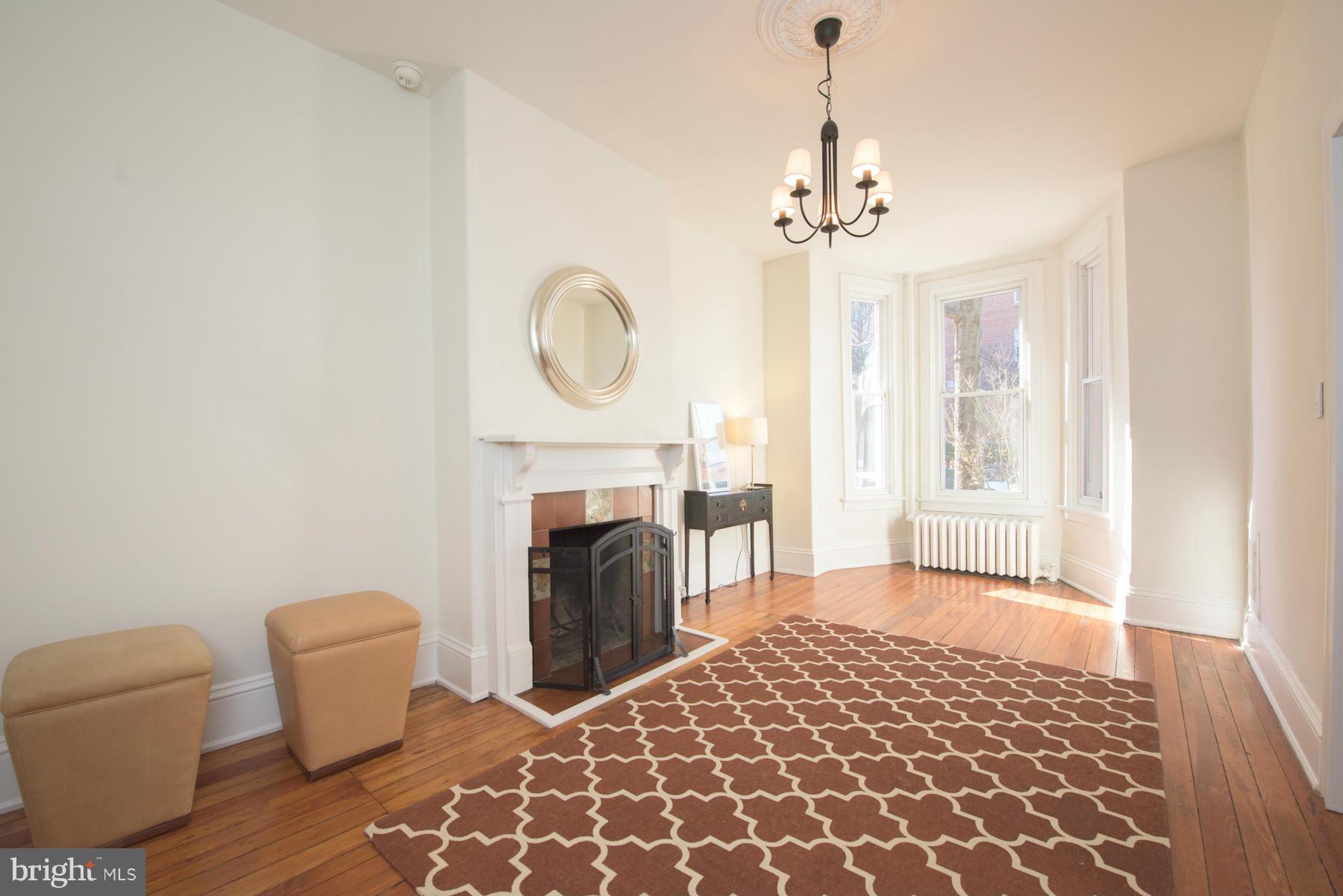 411 3rd Street Northeast Washington, DC 20002 - Photo 7 of 30 Sunny LR w/ wood fireplace