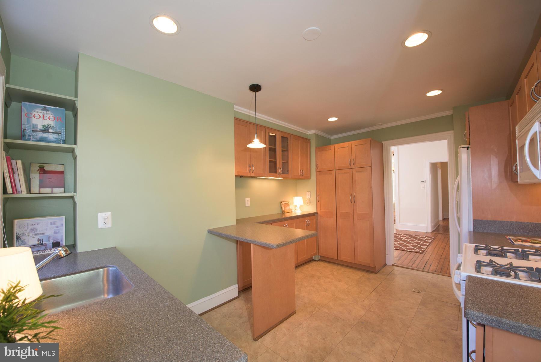411 3rd Street Northeast Washington, DC 20002 - Photo 10 of 30 Cabinets galore! Breakfast bar!