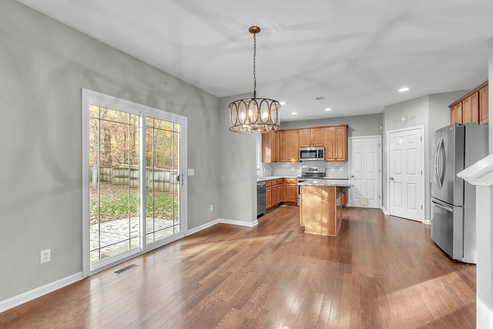 3924 Signature Court Smyrna, TN 37167 - Photo 11 of 35 a view of a kitchen with refrigerator and wooden floor
