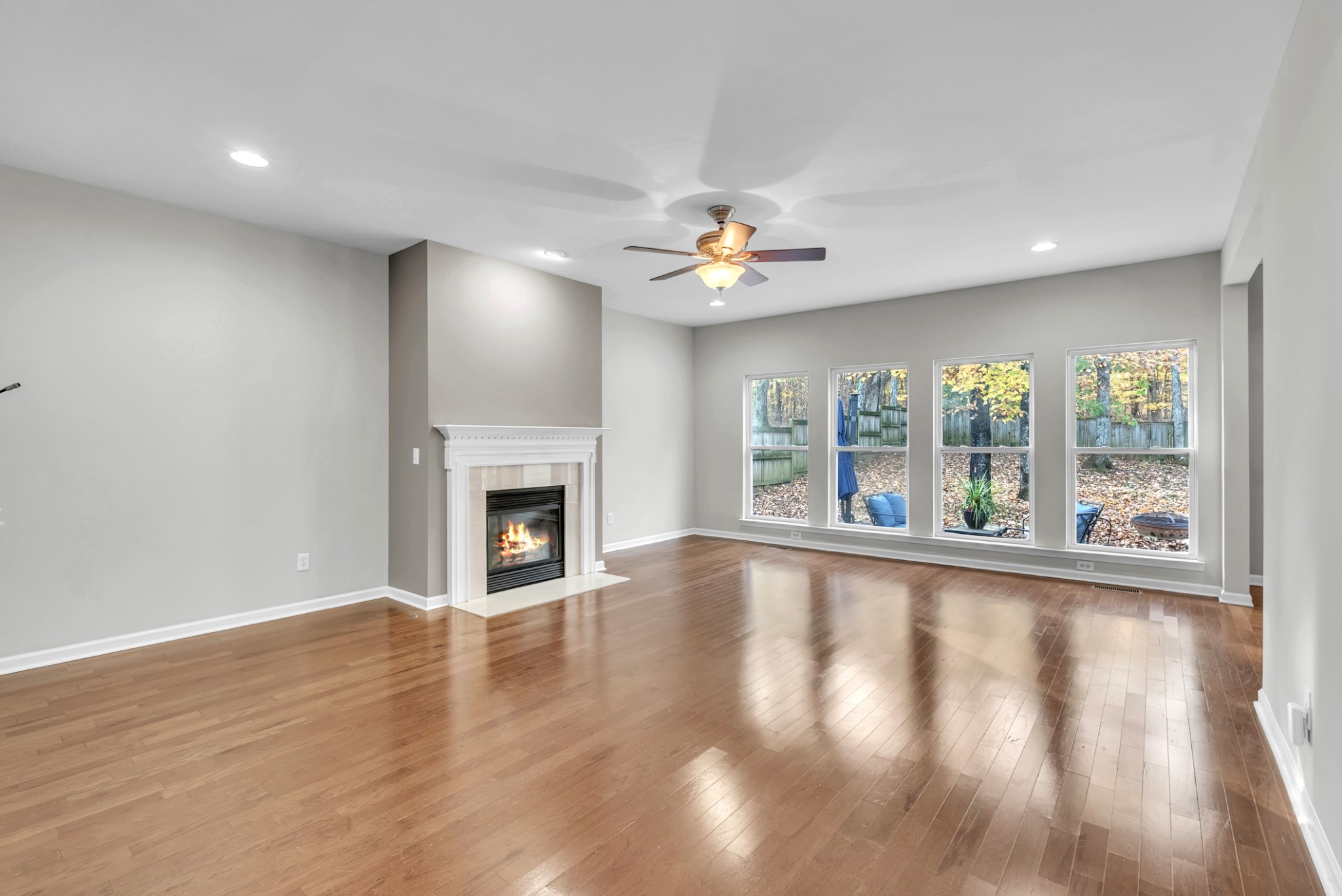 3924 Signature Court Smyrna, TN 37167 - Photo 13 of 35 a view of an empty room with a fireplace and a window