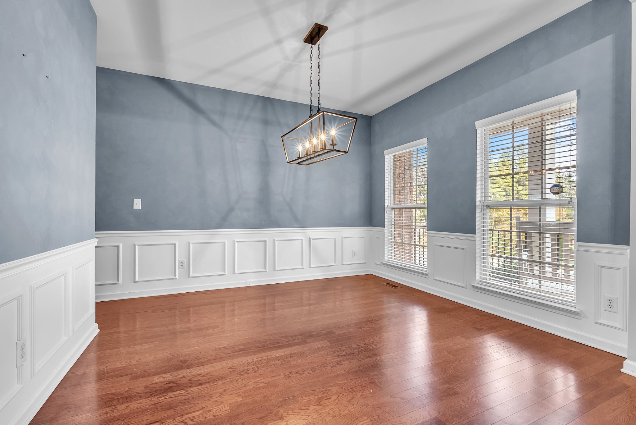 3924 Signature Court Smyrna, TN 37167 - Photo 16 of 35 a view of an empty room with wooden floor and a window