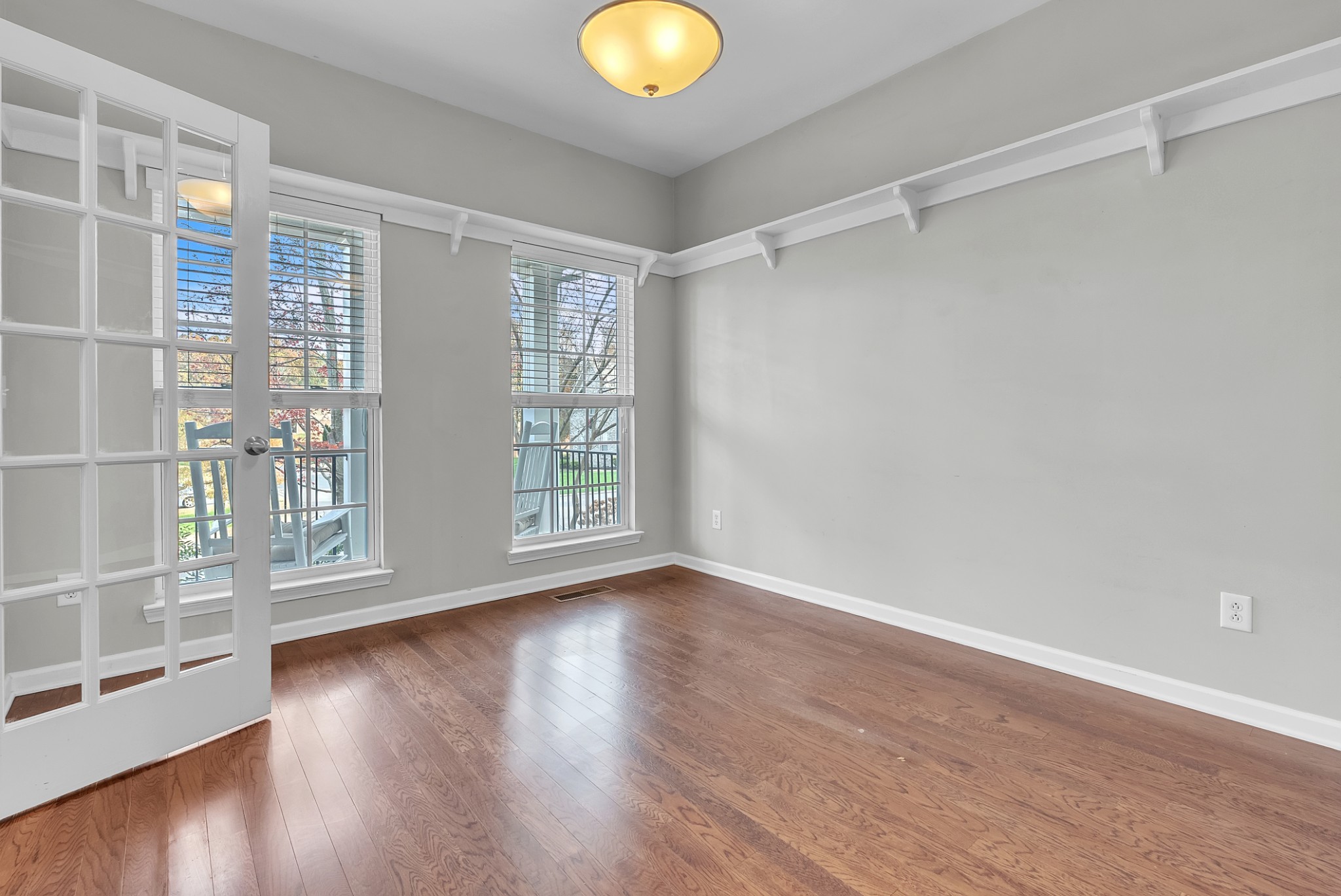 3924 Signature Court Smyrna, TN 37167 - Photo 19 of 35 a view of an empty room with wooden floor and a window