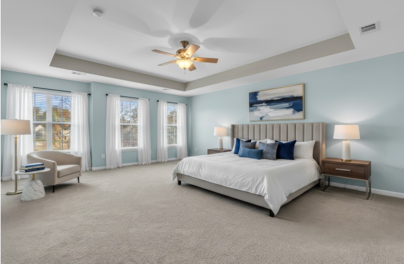 3924 Signature Court Smyrna, TN 37167 - Photo 22 of 35 a bedroom with a large bed and a chandelier