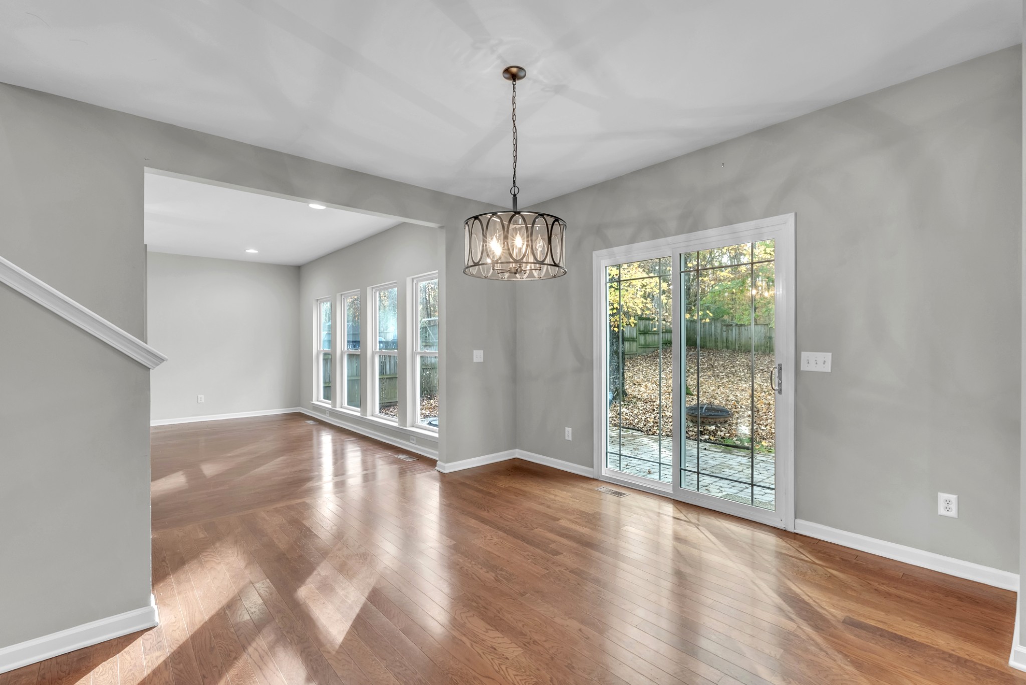 3924 Signature Court Smyrna, TN 37167 - Photo 10 of 35 a view of an empty room with wooden floor and a window