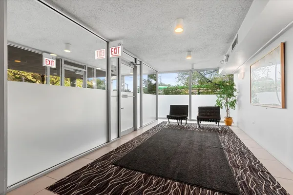 a view of a porch with seating space