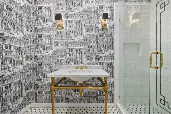a bathroom with a shower and a sink