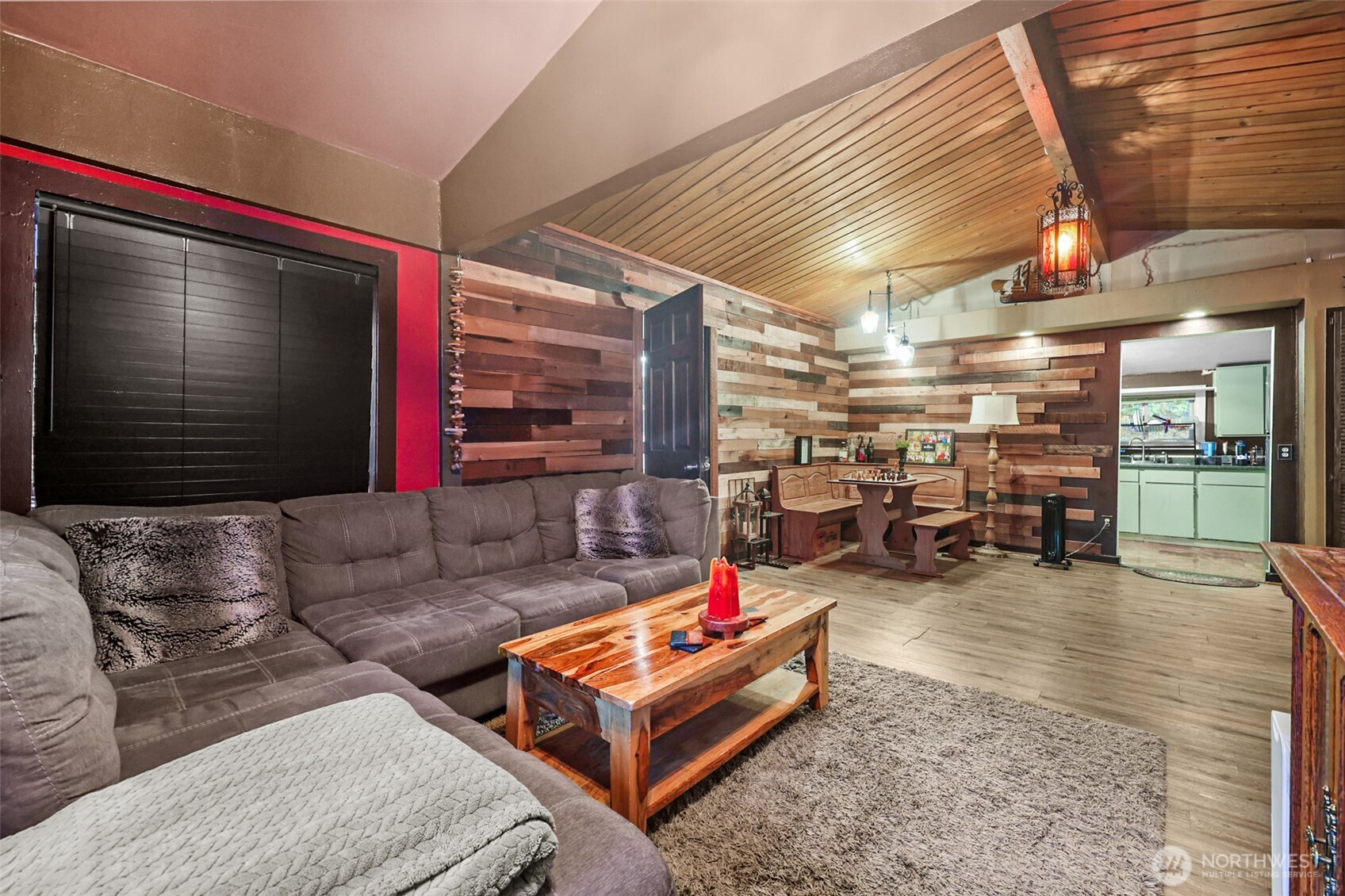 13109 Crystal Springs Road Granite Falls, WA 98252 - Photo 2 of 32 a living room with furniture and a flat screen tv