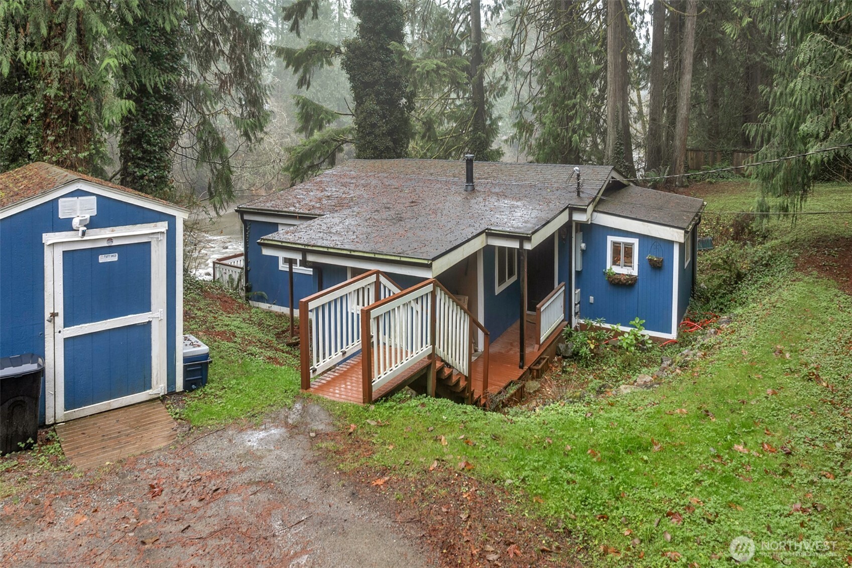 13109 Crystal Springs Road Granite Falls, WA 98252 - Photo 29 of 32 an aerial view of a house with a yard and large trees
