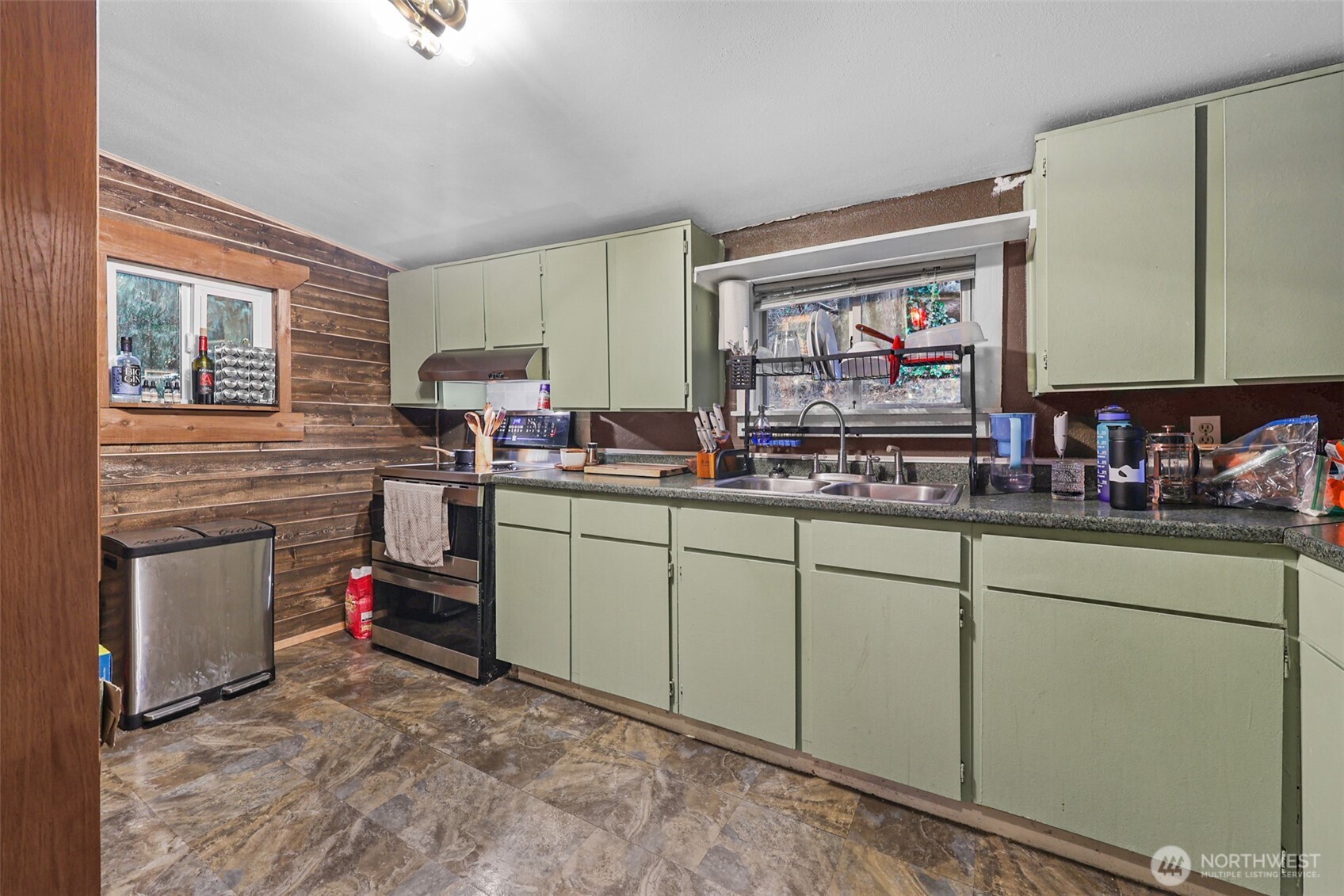 13109 Crystal Springs Road Granite Falls, WA 98252 - Photo 4 of 32 a kitchen with sink cabinets and window