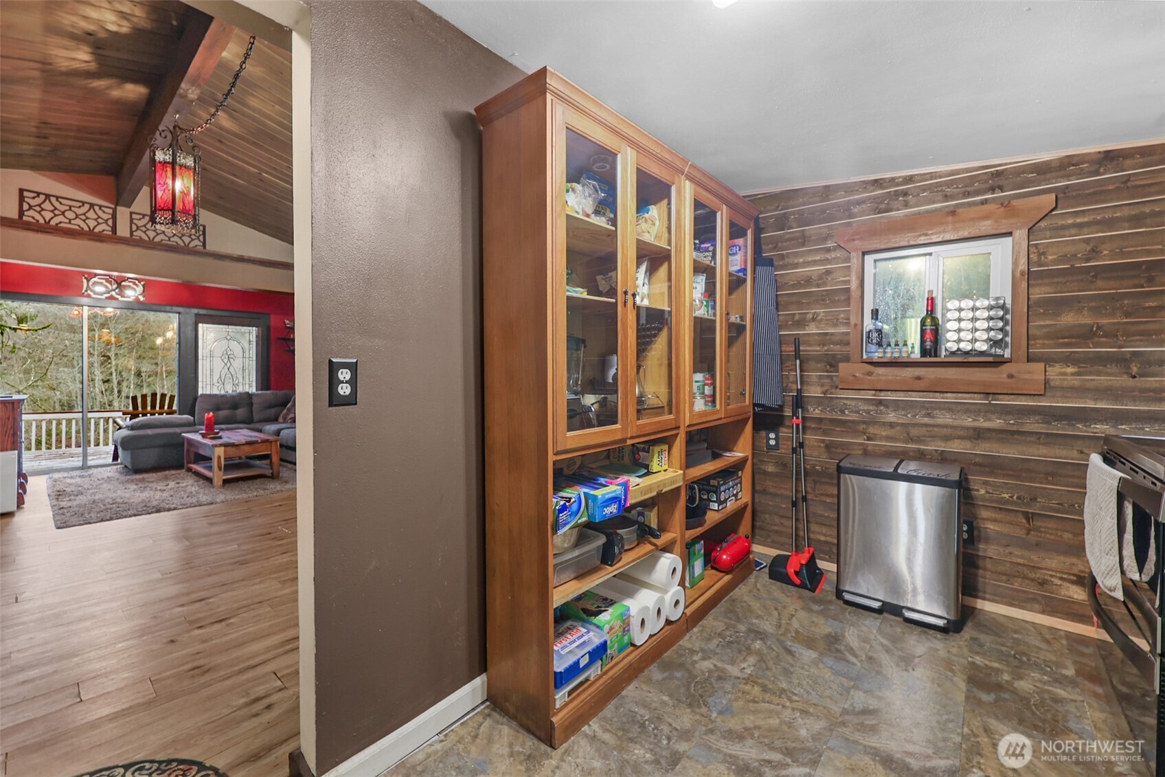 13109 Crystal Springs Road Granite Falls, WA 98252 - Photo 5 of 32 a view of living room with a flat screen tv and a floor to ceiling window