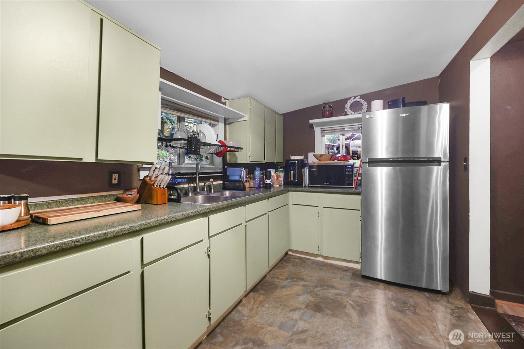 13109 Crystal Springs Road Granite Falls, WA 98252 - Photo 6 of 32 a kitchen with a refrigerator and a sink