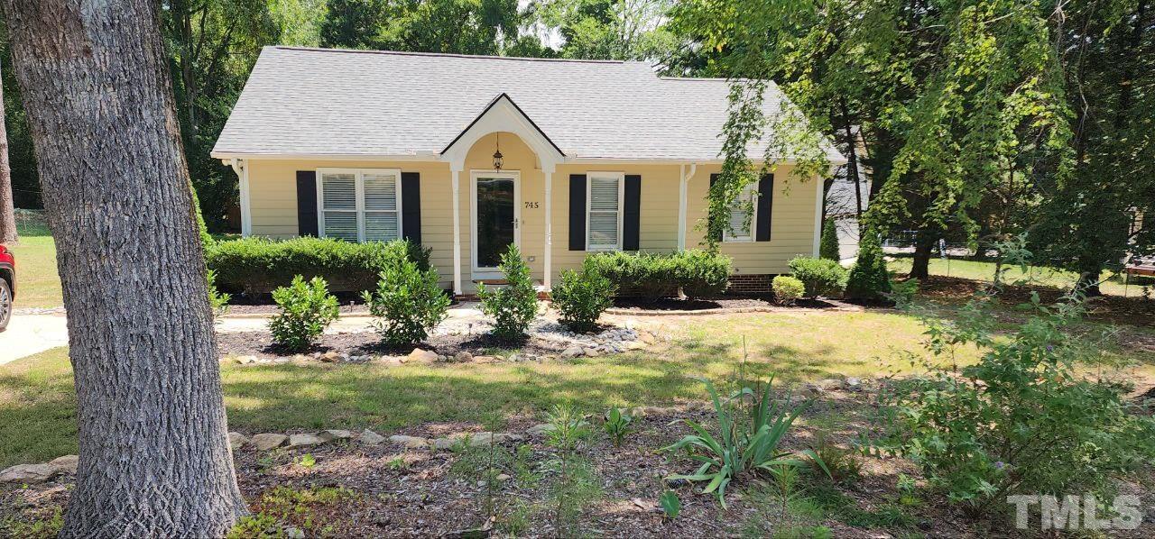 745 Brewer Circle Wake Forest, NC 27587 - Photo 1 of 18 a view of a house with a yard