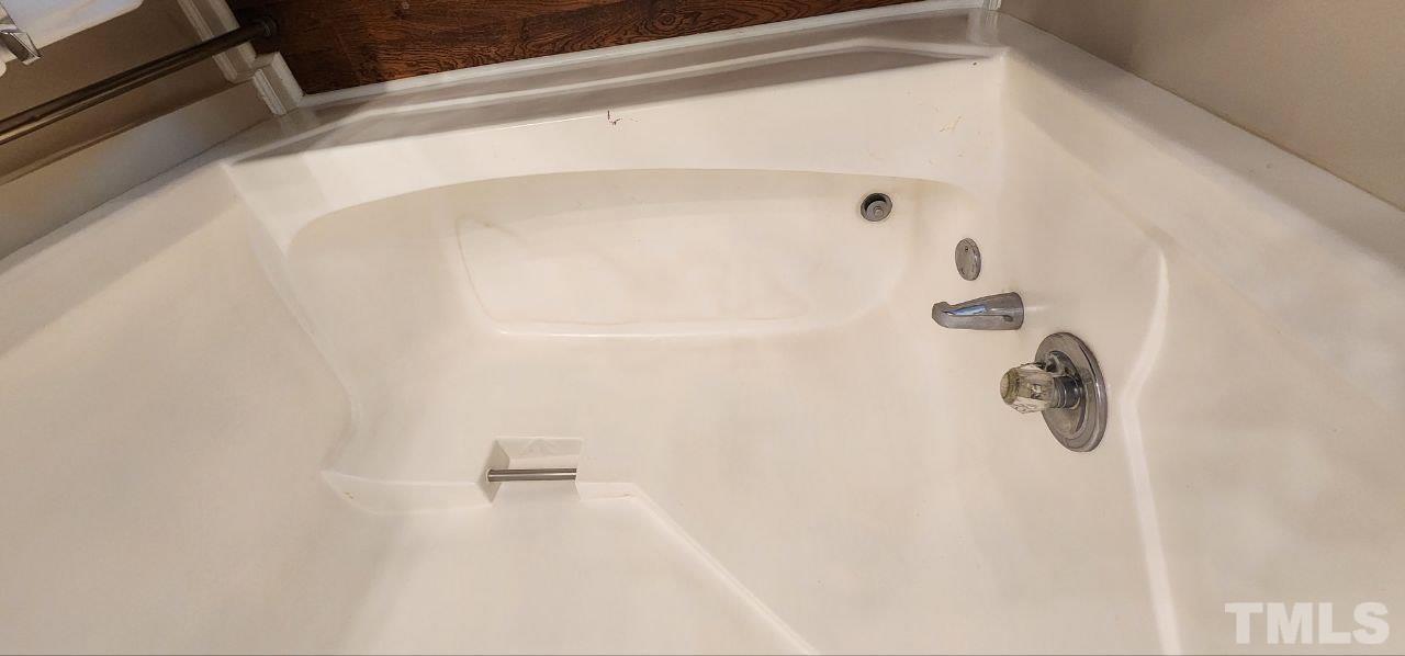 745 Brewer Circle Wake Forest, NC 27587 - Photo 12 of 18 a bathroom with a shower