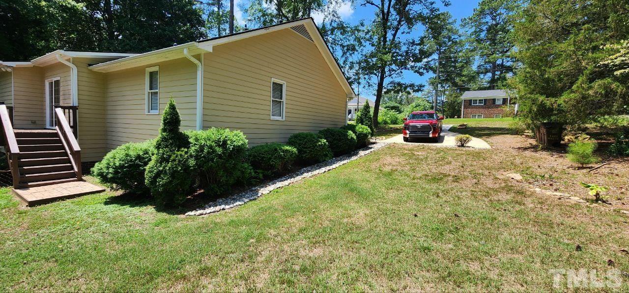745 Brewer Circle Wake Forest, NC 27587 - Photo 4 of 18 a view of a back yard of the house