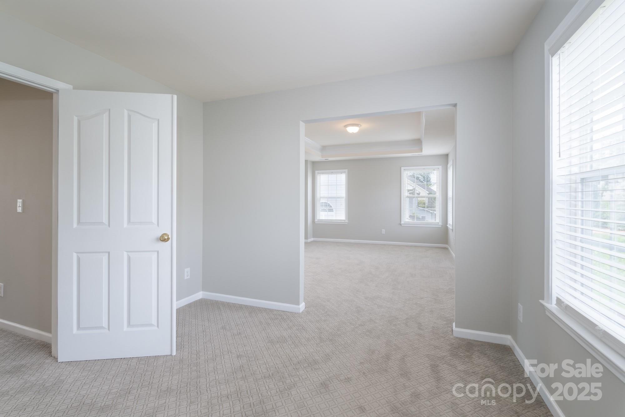 4392 Sunset Rose Drive Fort Mill, SC 29708 - Photo 17 of 39 a view of empty room with windows