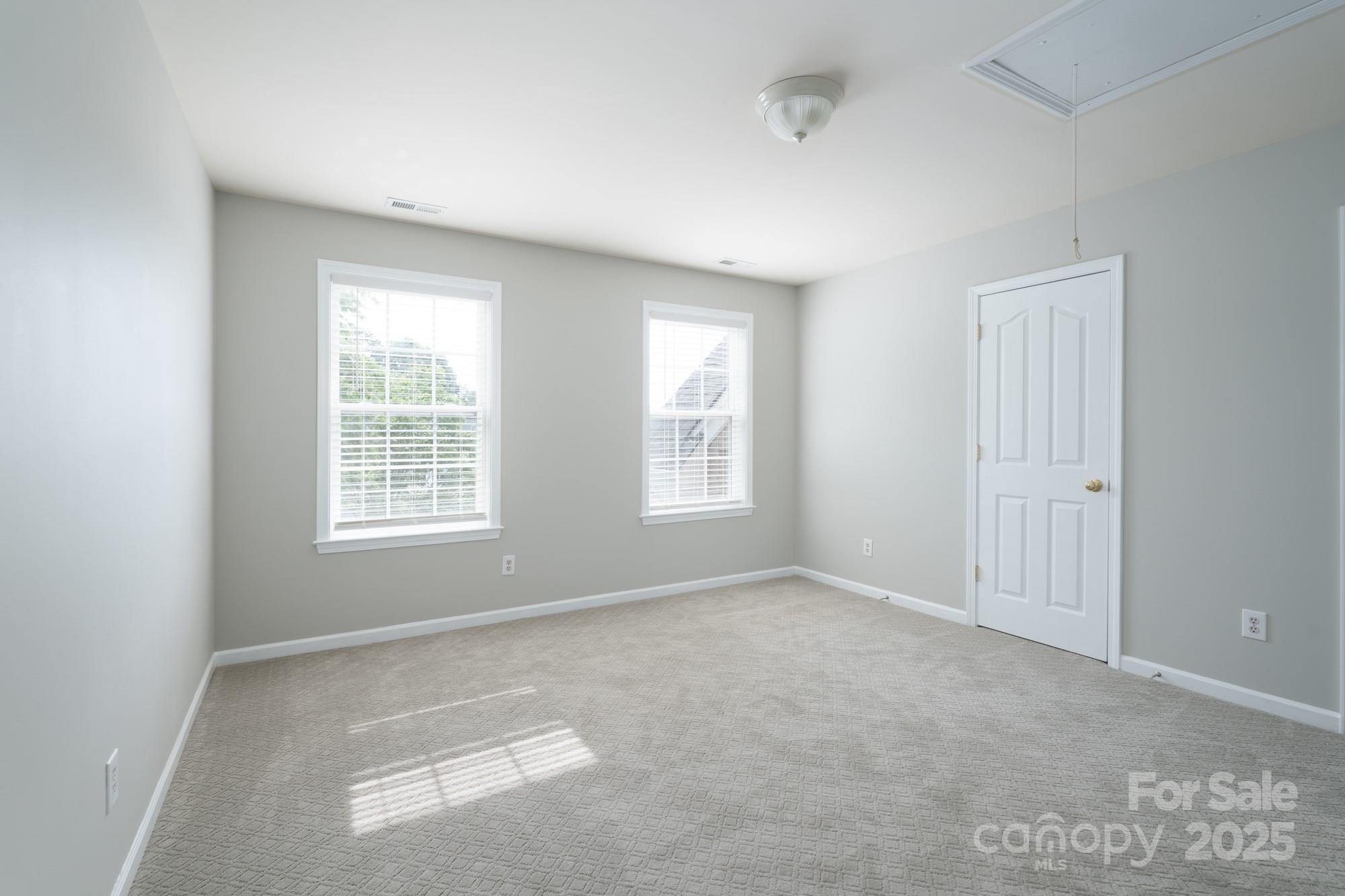 4392 Sunset Rose Drive Fort Mill, SC 29708 - Photo 26 of 39 an empty room with windows