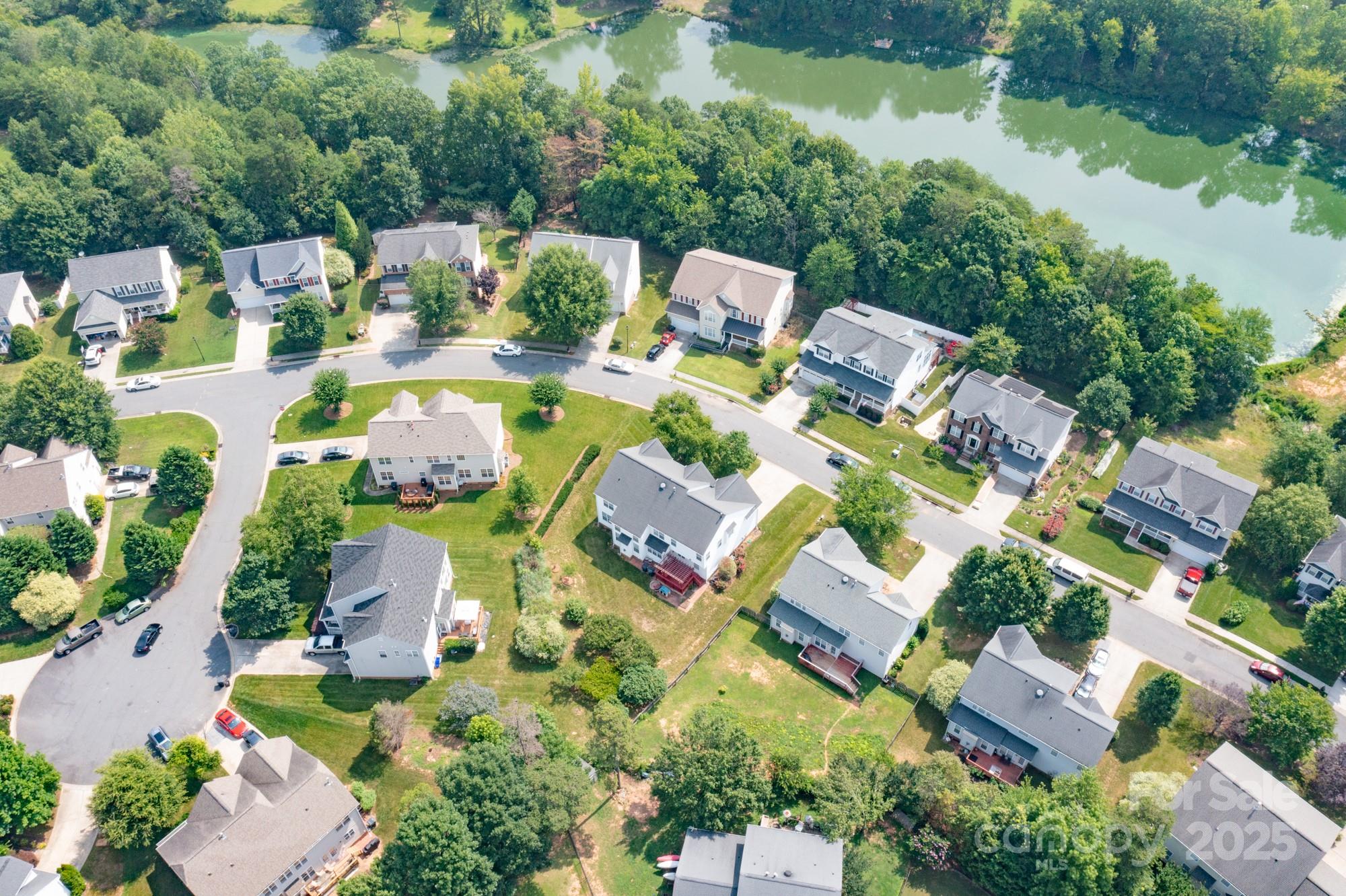 4392 Sunset Rose Drive Fort Mill, SC 29708 - Photo 36 of 39 an aerial view of a house with outdoor space