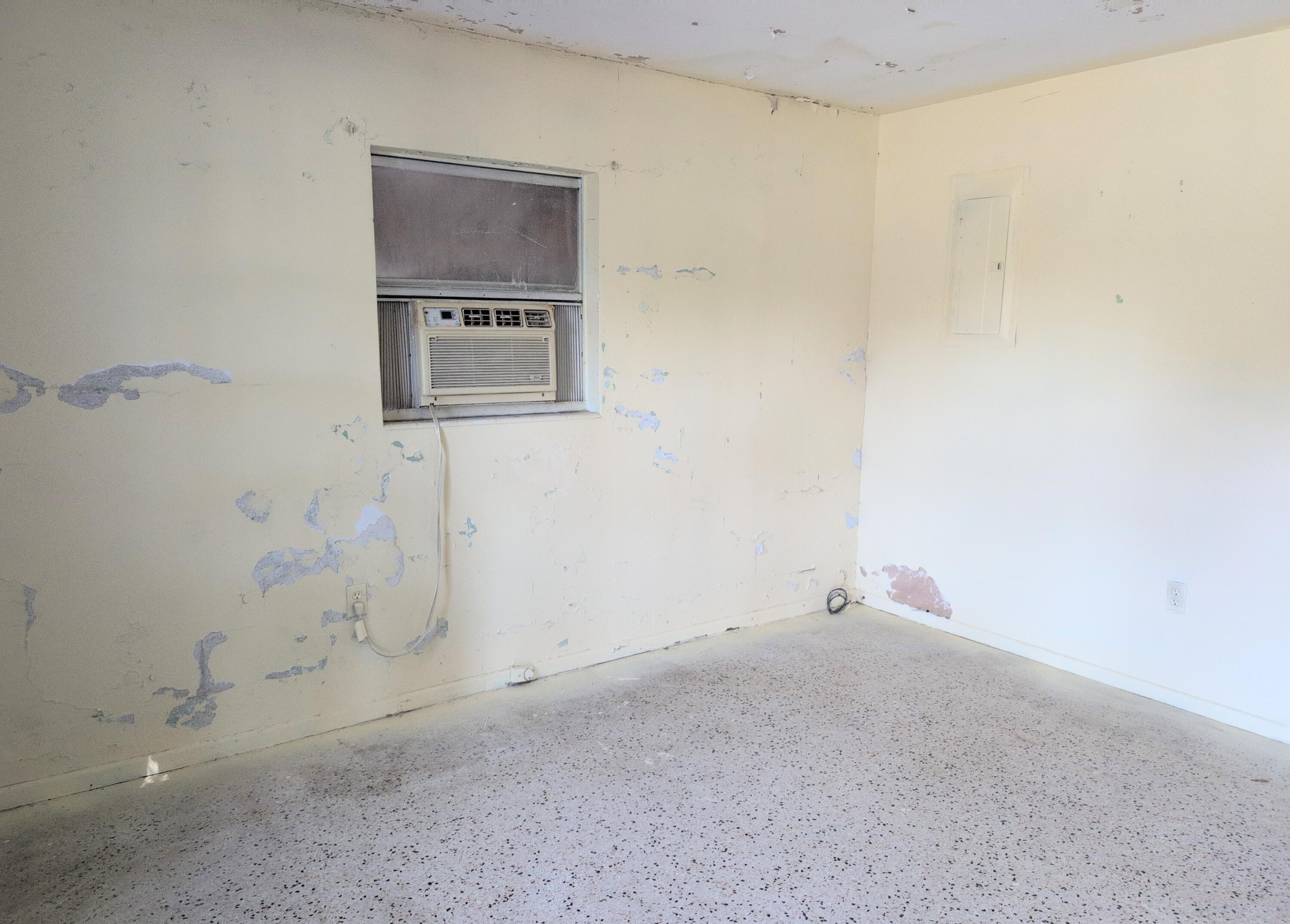 1606 Ave H Fort Pierce, FL 34950 - Photo 3 of 9 a room with a window