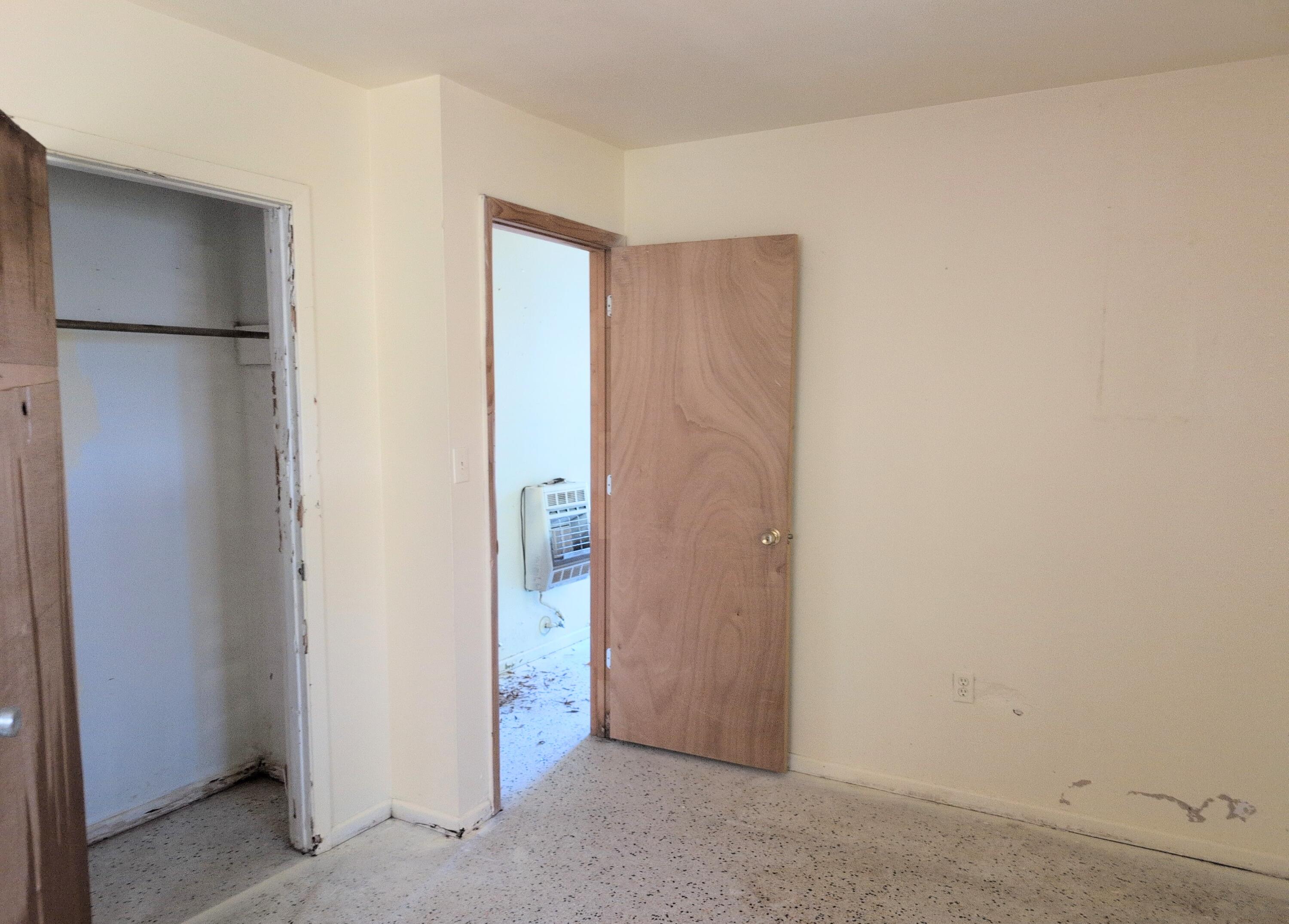 1606 Ave H Fort Pierce, FL 34950 - Photo 5 of 9 a view of a kitchen with a refrigerator and a refrigerator
