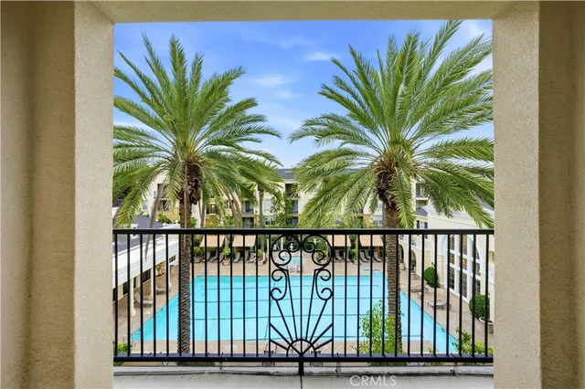 a view of a swimming pool with a backyard