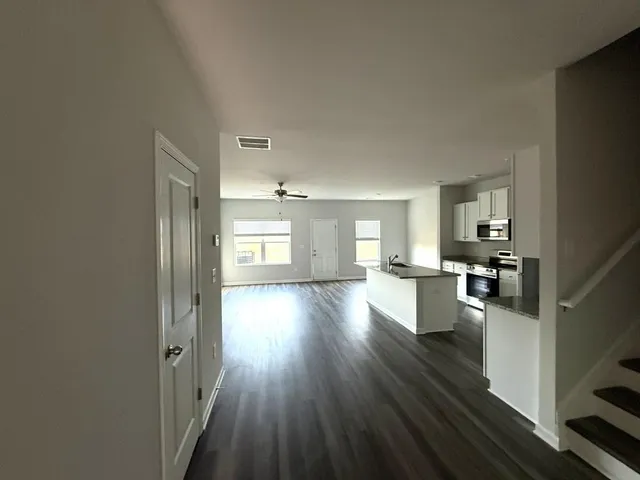 a view of a living room and dining room