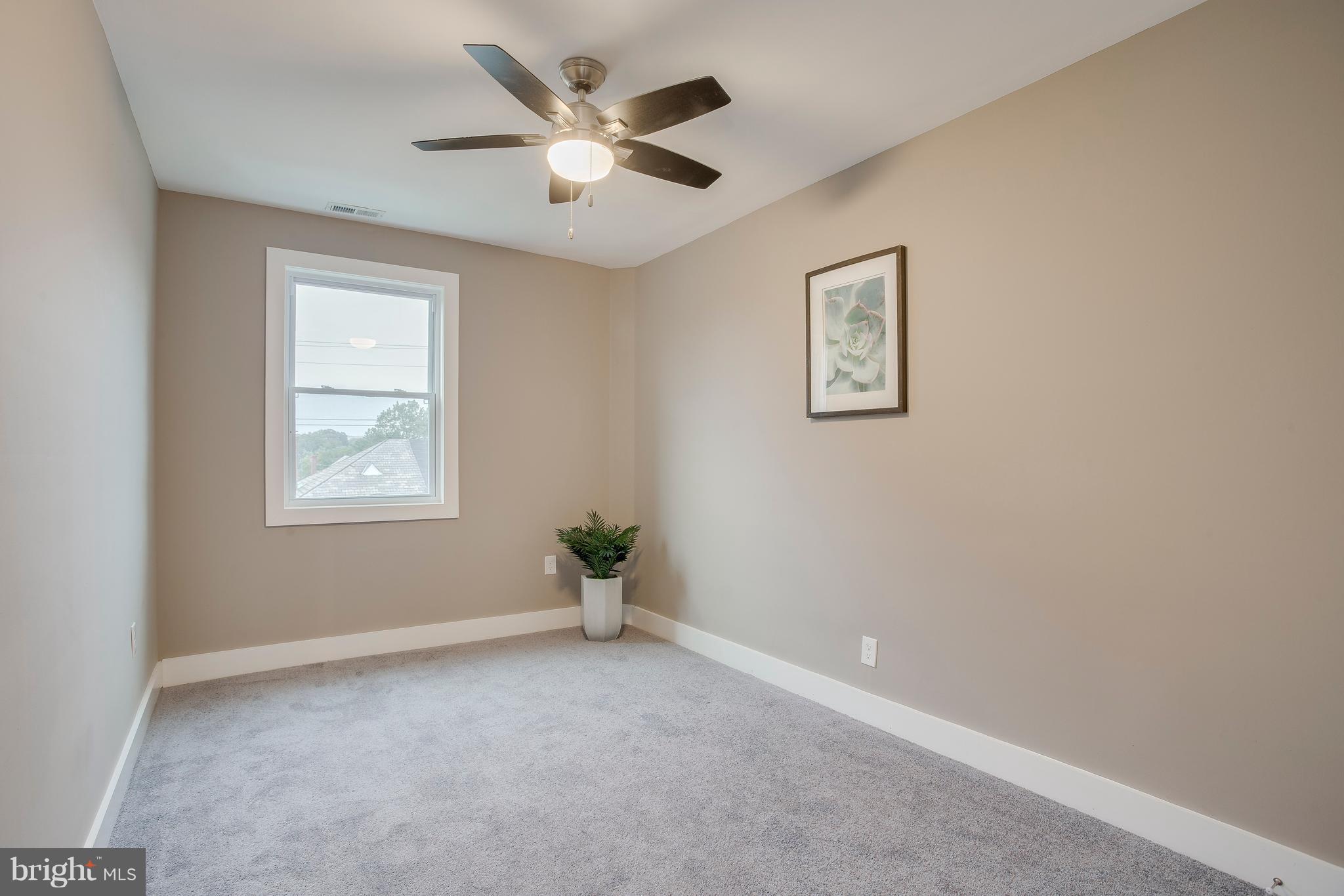 1500 Sheffield Road Baltimore, MD 21218 - Photo 22 of 30 an empty room with a window