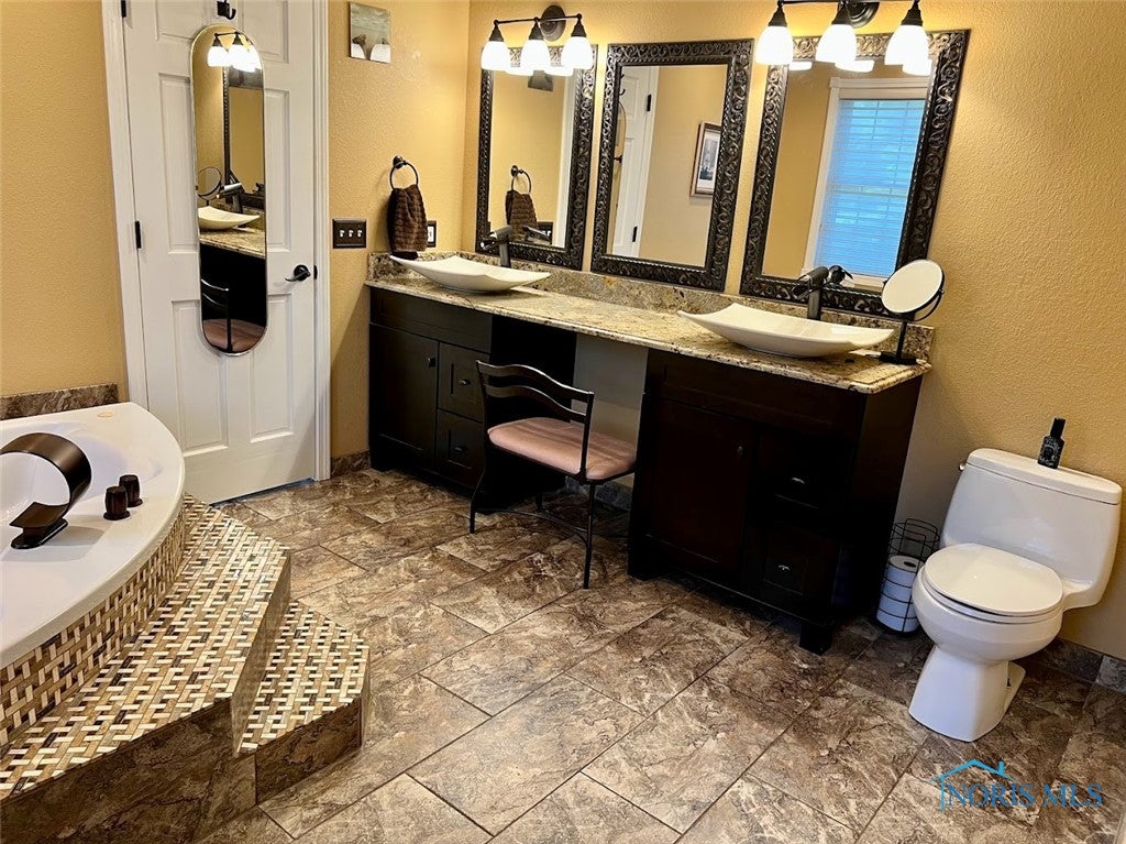 3525 Albon Road Maumee, OH 43537 - Photo 30 of 48 Double vanity Kohler sinks in master bath. Kohler toilets and faucets. Specialty ceramic tile flooring.