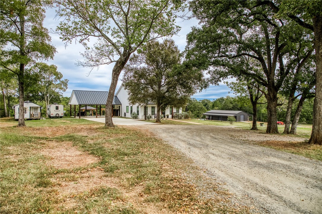 264 Farm To Market 833 Streetman, TX 75859 - Photo 3 of 19 a view of road with trees