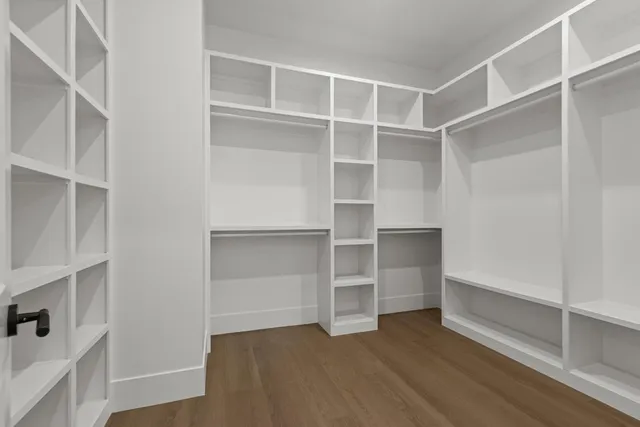 a kitchen with a stove and cabinets