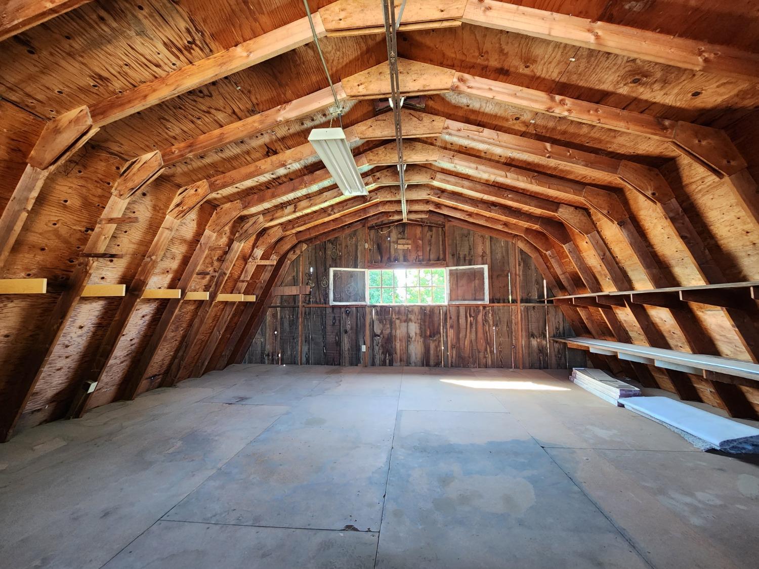 1215 12th Street Reedley, CA 93654 - Photo 54 of 58 a view of a house with a roof