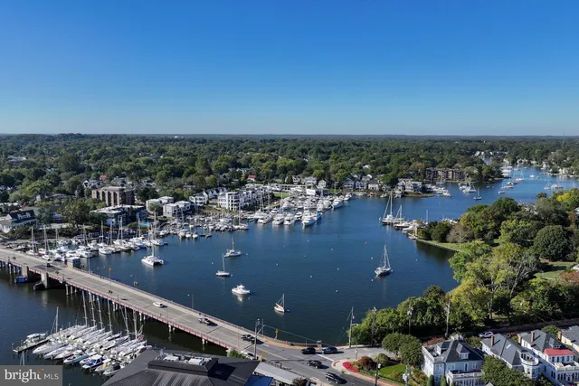 a patio with water view and city view