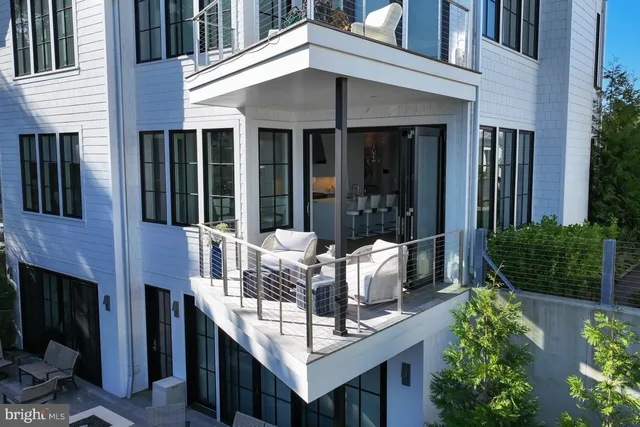 a living room with fireplace furniture and a flat screen tv