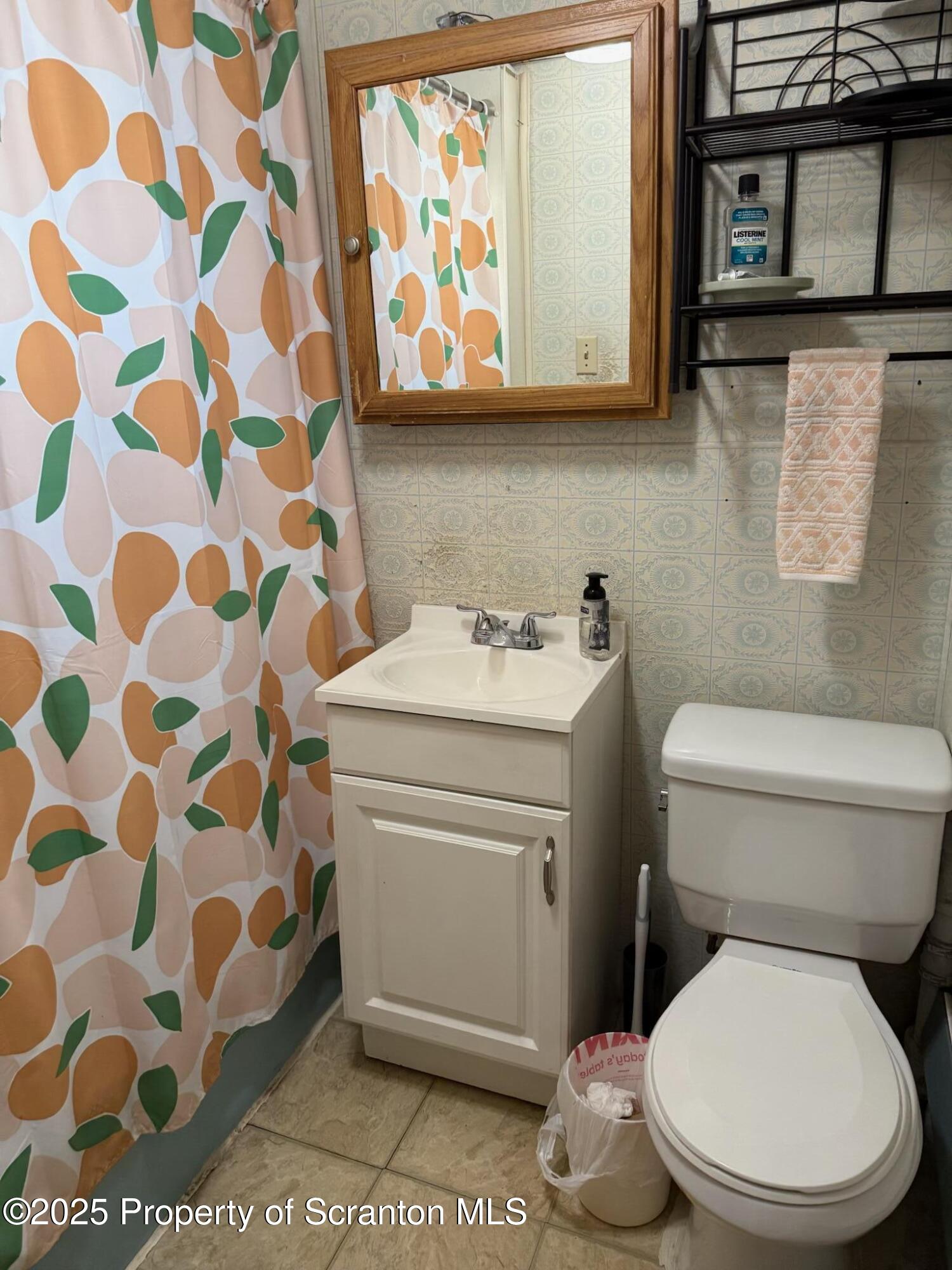 108 3rd Street Blakely, PA 18447 - Photo 25 of 27 a bathroom with a toilet and a sink