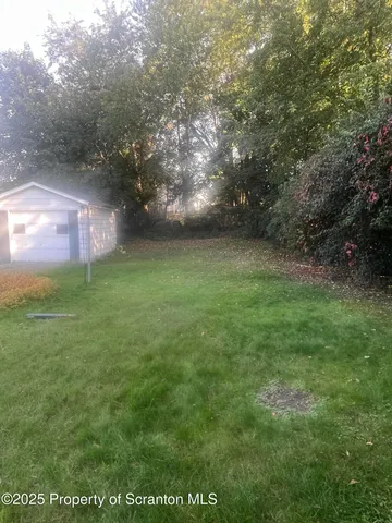 a backyard of a house with seating space