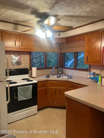 a room with furniture and wooden floor