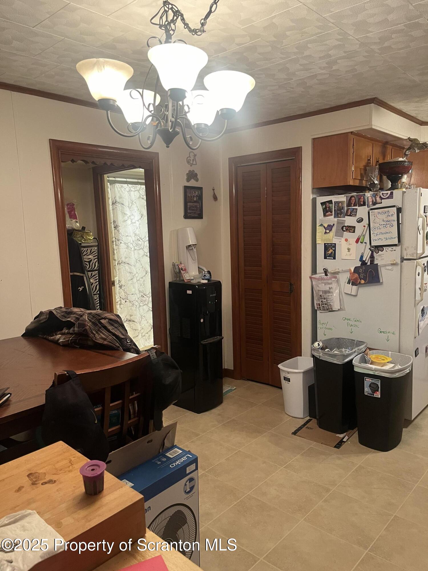 108 3rd Street Blakely, PA 18447 - Photo 10 of 27 a room with furniture and wooden floor