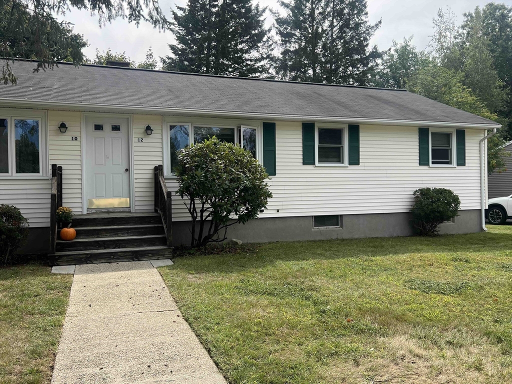 a view of a house with a garden