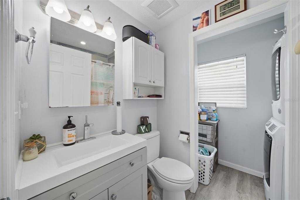 15823 Redington Drive Redington Beach, FL 33708 - Photo 12 of 39 a bathroom with a sink a toilet and shower