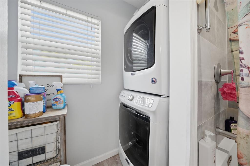 15823 Redington Drive Redington Beach, FL 33708 - Photo 13 of 39 a utility room with dryer washer and a window