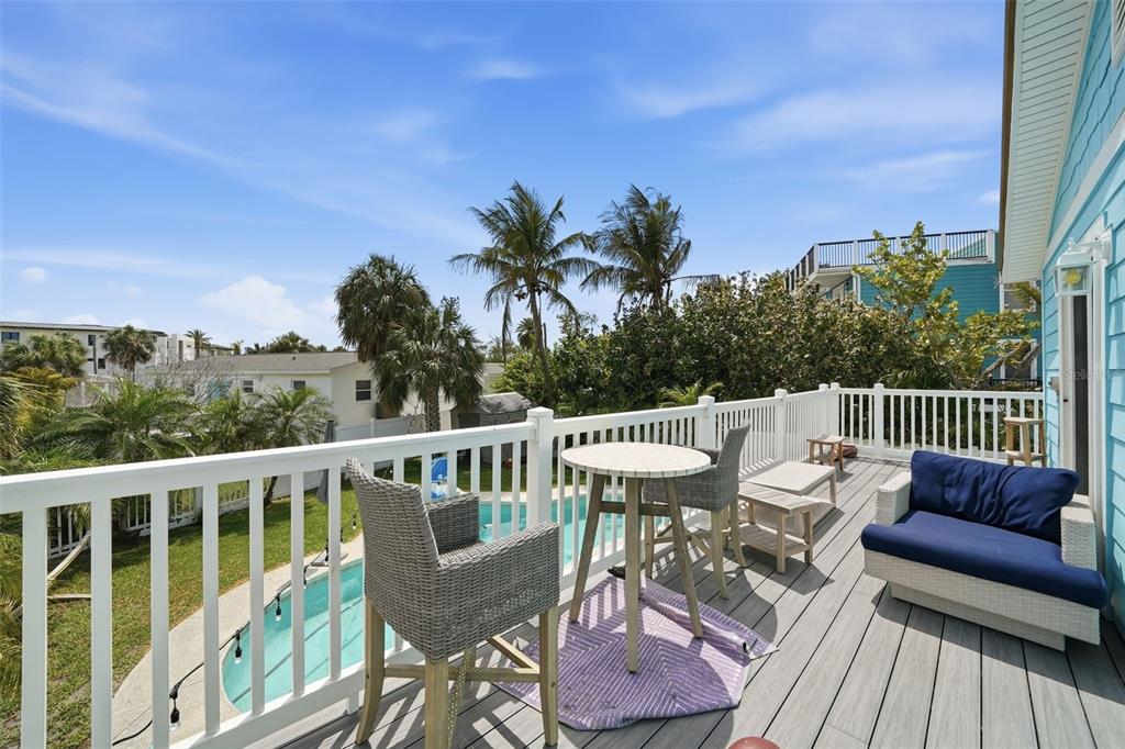 15823 Redington Drive Redington Beach, FL 33708 - Photo 18 of 39 a view of a patio on wooden deck and a backyard