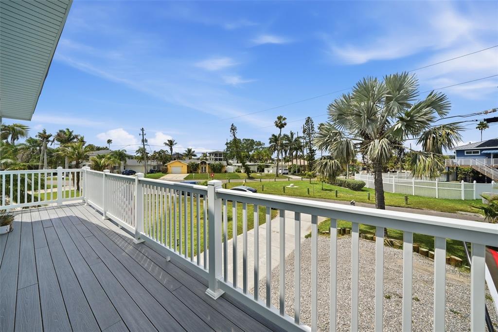 15823 Redington Drive Redington Beach, FL 33708 - Photo 20 of 39 a view of a balcony with wooden floor