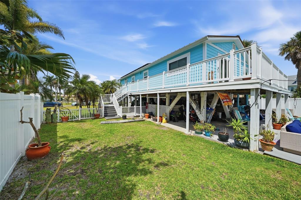 15823 Redington Drive Redington Beach, FL 33708 - Photo 22 of 39 a front view of a house with garden