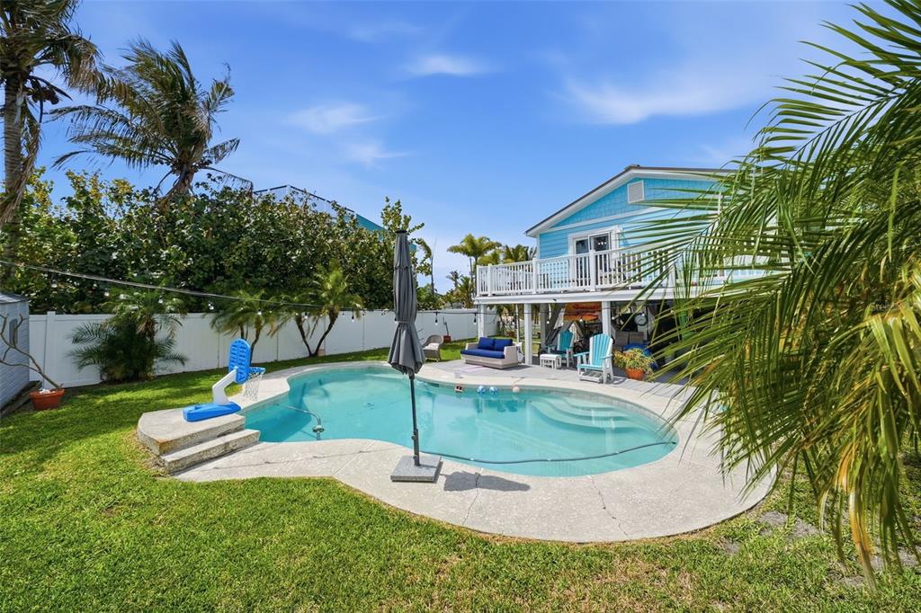 15823 Redington Drive Redington Beach, FL 33708 - Photo 24 of 39 a view of a house with a yard