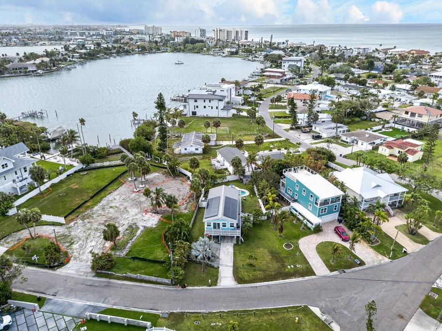 15823 Redington Drive Redington Beach, FL 33708 - Photo 34 of 39 an aerial view of residential houses with outdoor space and lake view