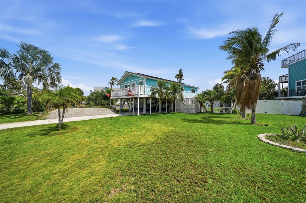 15823 Redington Drive Redington Beach, FL 33708 - Photo 4 of 39 a view of a house with a yard