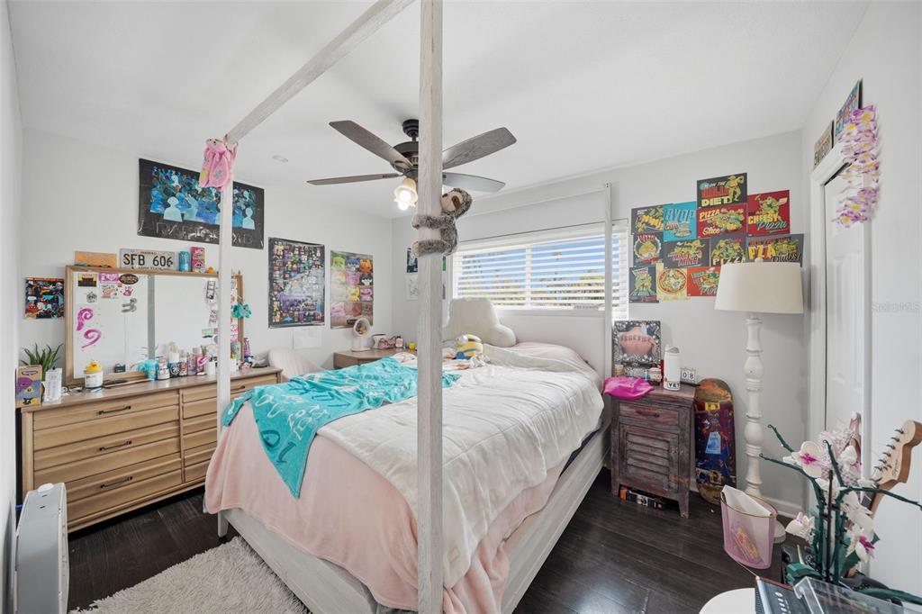 15823 Redington Drive Redington Beach, FL 33708 - Photo 10 of 39 a bed room with a bed mirror and a window