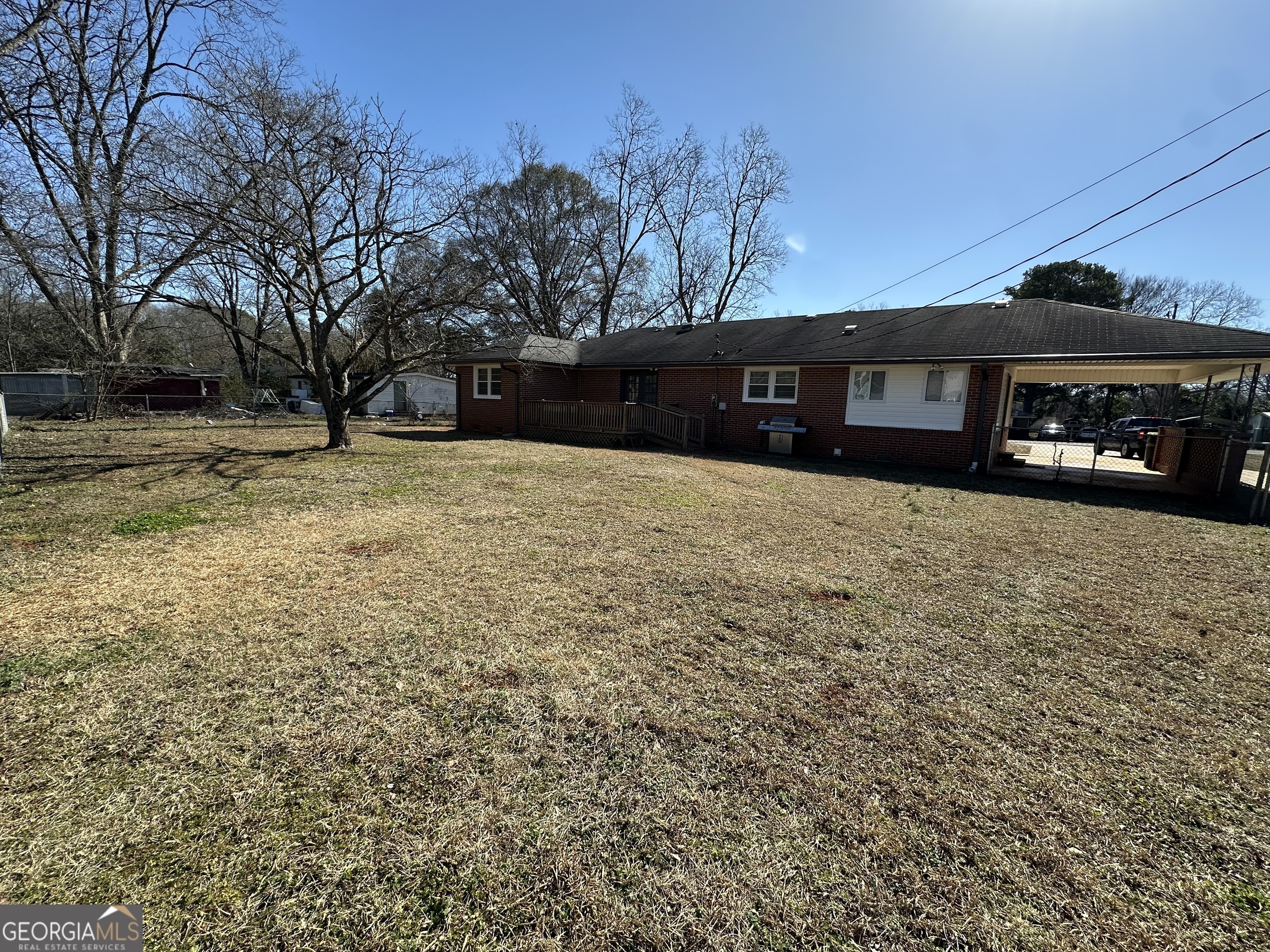 306 Garner Street Thomaston, GA 30286 - Photo 38 of 59 a front view of a house with a yard