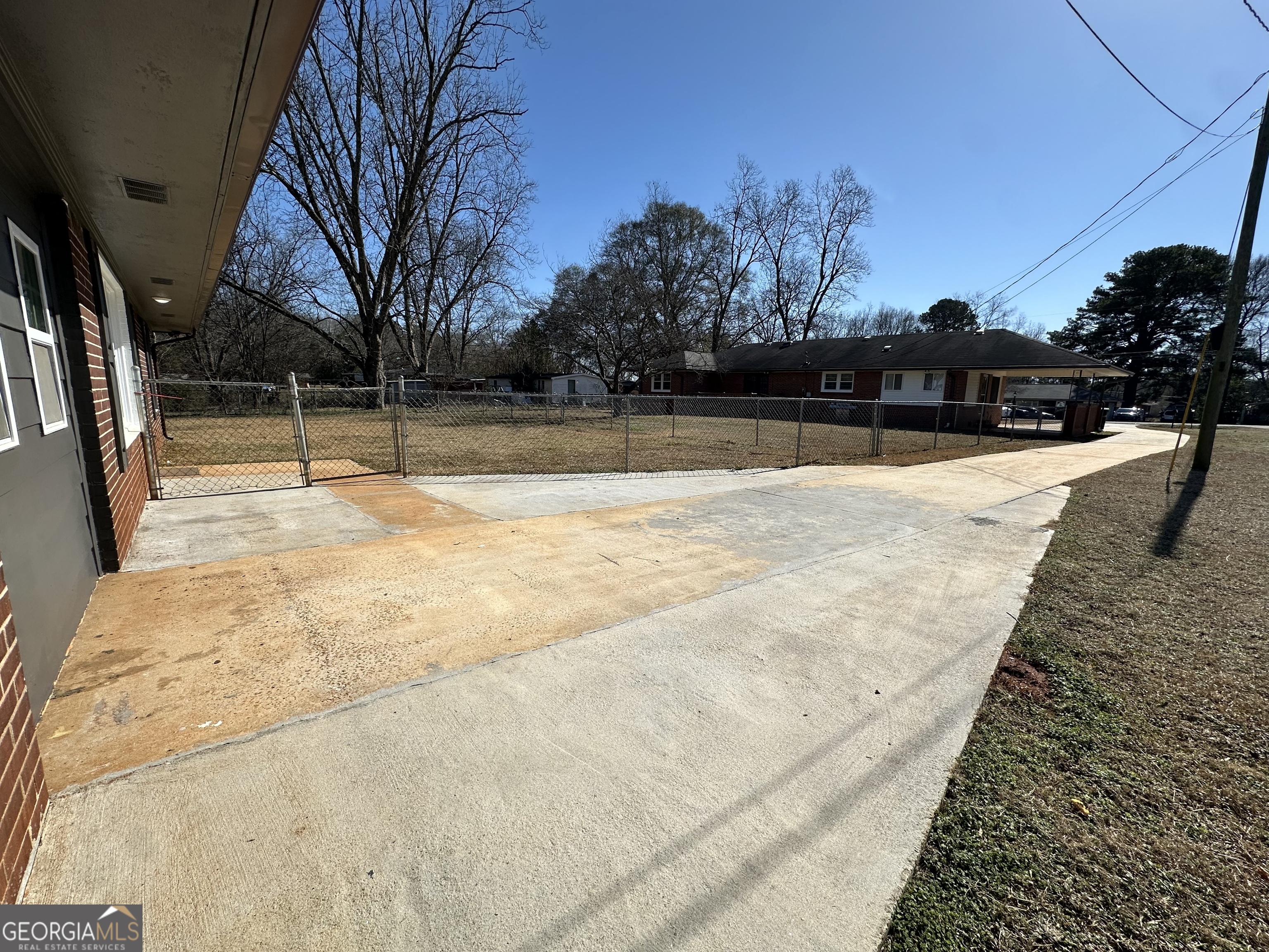 306 Garner Street Thomaston, GA 30286 - Photo 41 of 59 a view of swimming pool with trees